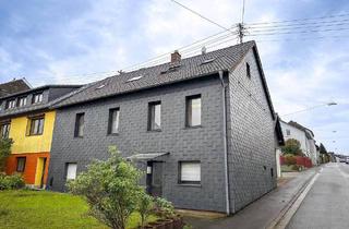 Haus kaufen in 66292 Riegelsberg, Riegelsberg - Dreiparteienhaus mit 5 Garagen und der Möglichkeit zur Neuvermietung nach eigenen Vorstellungen