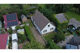 Einfamilienhaus kaufen in 16833 Fehrbellin, Sanierungsbedürftiges Einfamilienhaus mit viel Nebengelass im Storchendorf "Linum"