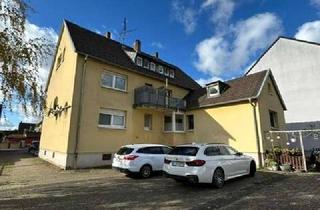 Haus kaufen in 50769 Merkenich, 7 Familienhaus mit 5 Garagen und Stellplätzen in guter Lage im Kölner Norden