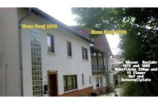 Haus kaufen in 67823 Obermoschel, Obermoschel - Zwei Häuser mit Balkon zwischen den Häusern.