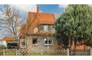 Doppelhaushälfte kaufen in 04564 Böhlen, Doppelhaushälfte mit Potenzial – charmantes Sanierungsobjekt wartet auf fleißige Hände