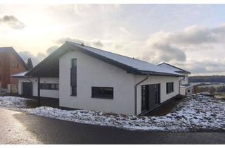 Haus kaufen in 35794 Mengerskirchen, Modernes Wohnen auf einer Ebene – neuwertiger Bungalow mit Weitblick