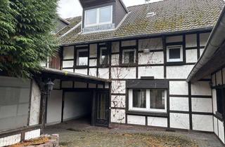 Haus kaufen in In Kuckum 94, 41812 Erkelenz, historisches Dorfhaus mit Werkstatt, Partylaube und Garage