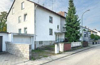 Mehrfamilienhaus kaufen in 85757 Karlsfeld, Mehrfamilienhaus mit großzügigem Garten und Entwicklungspotential