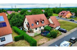 Haus kaufen in 97493 Bergrheinfeld, Familienfreundliches Eigenheim mit großem Garten und Gestaltungsmöglichkeiten