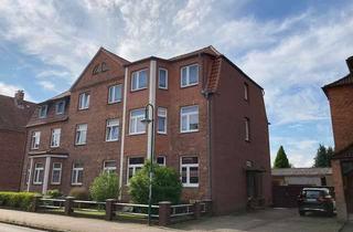 Anlageobjekt in 19230 Hagenow, Unterkellerte Dreifamilienhaushälfte mit schönem Garten, 3 Garagen und 2 Stellplätz