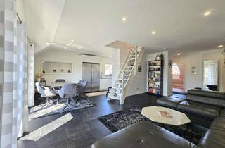 Wohnung kaufen in 61250 Usingen, Im Herzen von Usingen mit tollem Blick - Dachgeschosswohnung mit zwei Bädern & Tiefgaragenstellplatz