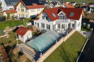 Einfamilienhaus kaufen in 61279 Grävenwiesbach, Wohnen mit Weitblick: energieeffizientes Einfamilienhaus mit Pool & Südterrasse