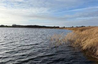 Immobilie kaufen in Seestraße A, 18586 Sellin, Sonnenverwöhntes Wassergrundstück am Selliner See mit Bootszugang