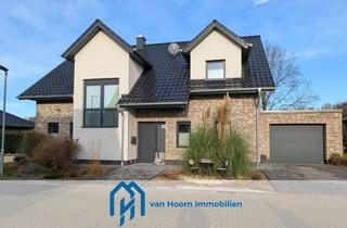 Einfamilienhaus kaufen in 26683 Saterland, Neuwertiges Einfamilienhaus mit Garage und Blick ins Grüne
