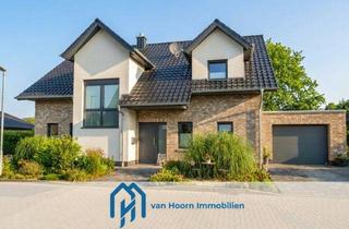 Einfamilienhaus kaufen in 26683 Saterland, Modernes Einfamilienhaus (2021) mit Garage, überdachter Terrasse und Blick ins Grüne