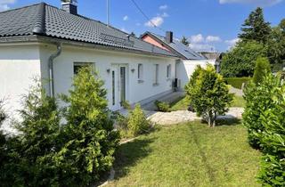 Haus kaufen in Kirchstraße, 56729 Weiler, Eleganter Energiespar - Winkelbungalow mit unverbaubarem Blick