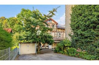 Haus kaufen in 37627 Stadtoldendorf, Stadtoldendorf - Liebevoll saniertes Fachwerkhaus - ideal als Wohn- und Geschäftshaus mit Garagen und Hof