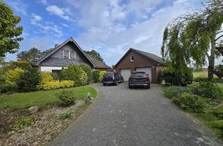 Einfamilienhaus kaufen in 26434 Wangerland, Wangerland - Großzügiges Einfamilienhaus mit freistehender großer Doppelgarage