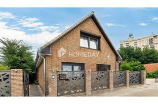 Einfamilienhaus kaufen in 27753 Delmenhorst, Delmenhorst - Einfamilienhaus mit zwei Wohneinheiten und großem Grundstück mit Baulandreserve