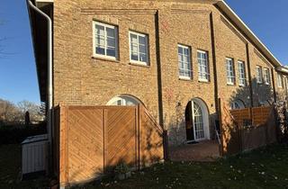 Wohnung kaufen in 24376 Kappeln, Sonnige Erdgeschosswohnung mit großzügiger Terrasse und Garten