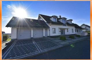 Einfamilienhaus kaufen in 55469 Riegenroth, Exklusives Einfamilienhaus mit Doppelgarage und Wintergarten in Riegenroth