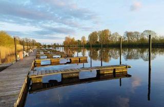 Haus kaufen in 25794 Tielenhemme, Ferienhaus mit Bootsanleger und traumhaftem Weitblick