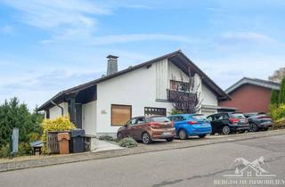 Haus kaufen in 51674 Wiehl, Familienidylle & Mieteinnahme – Zweifamilienhaus in Drabenderhöhe