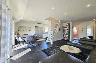 Wohnung kaufen in 61250 Usingen, Usingen - Im Herzen von Usingen mit tollem Blick - Dachgeschosswohnung mit zwei Bädern & Tiefgaragenstellplatz