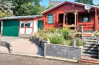 Haus kaufen in 56761 Düngenheim, Düngenheim - Ihr Rückzugsort im Grünen BLOCKBOHLENHAUS