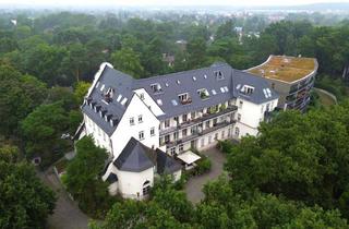 Wohnung kaufen in 12683 Biesdorf, Historischer Charme trifft modernes Wohnen – Exklusive 2-Zimmer-DG-Wohnung in Berlin-Biesdorf