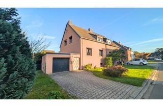 Doppelhaushälfte kaufen in Dirschauer Weg, 40599 Hassels, Ruhig, grün, familienfreundlich – Doppelhaushälfte an der Grenze zu Benrath