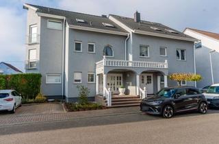 Mehrfamilienhaus kaufen in 76344 Eggenstein-Leopoldshafen, Erstklassiges Renditeobjekt in Top-Lage von Eggenstein! Mehrfamilienhaus mit Stellplätzen und Garage