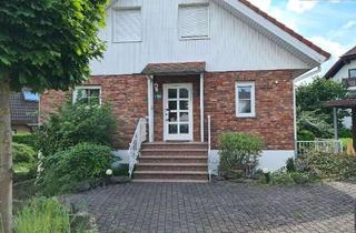 Einfamilienhaus kaufen in Kopernikusweg 10, 35447 Reiskirchen, Wohnen mit Wohlfühlfaktor – Einfamilienhaus mit ELW in herrlich ruhiger Lage von Reiskirchen