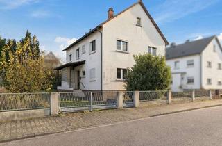 Haus kaufen in 76287 Rheinstetten, Freistehendes Zweifamilienhaus mit großem Garten in Rheinstetten-Forchheim