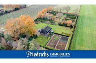 Haus kaufen in 26188 Edewecht, Großzügiges EFH mit Modernisierungsbedarf u. Garage auf großem Grundstück in Alleinlage von Edewecht