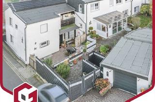 Haus kaufen in 53359 Rheinbach, Wohnen und Vermieten? Zwei modernisierte Einfamilienhäuser mit Garten und Garage in Merzbach
