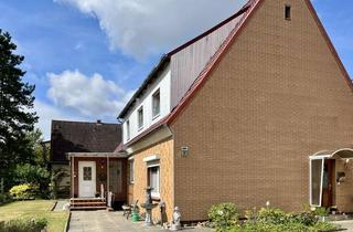 Haus kaufen in 38179 Schwülper, Charmantes Ein-/Zweifamilienhaus mit Einliegerwohnung und großzügigem Garten