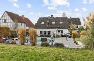 Einfamilienhaus kaufen in 59457 Werl, Zwei modernisierte Einfamilienhäuser - Fachwerk- und Fertighaus mit Pool in Werl-Hilbeck