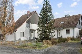 Einfamilienhaus kaufen in 59457 Werl, Zwei modernisierte Einfamilienhäuser auf einem großzügigen Grundstück mit Pool in Werl- Hilbeck