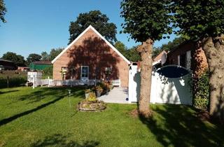 Haus kaufen in 26835 Hesel, Hesel - Grungstück mit kleinem älterem Nebengebäude zu verkaufen