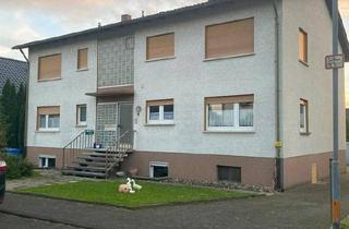 Haus kaufen in 35444 Biebertal, Biebertal - Zweifamilienhaus mit ELW