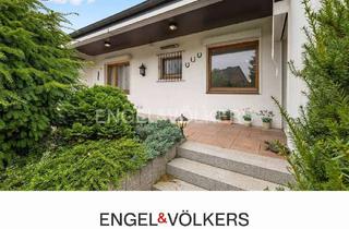 Haus kaufen in 24558 Henstedt-Ulzburg, Ihr neues Zuhause: Bungalow mit Wohlfühlgarten und Kamin