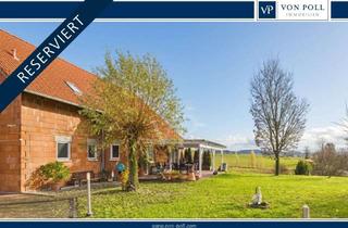 Haus kaufen in 97486 Königsberg, Landidylle genießen: Ebenerdiges Wohnen mit erholsamen Weitblick - Sofort bezugsfrei