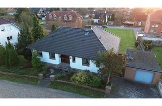 Haus kaufen in 31089 Duingen, Idyllisches Wohnen: Moderner Winkelbungalow mit Einliegerwohnung und Ausbaureserve in beliebter Lage