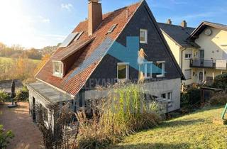 Einfamilienhaus kaufen in 34295 Edermünde, Freistehendes Einfamilienhaus mit Einliegerwohnung in ruhiger Lage von Edermünde-Grifte!