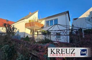 Einfamilienhaus kaufen in 64572 Büttelborn, Charmantes Einfamilienhaus mit viel Platz für die ganze Familie in Büttelborn