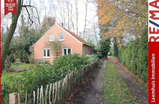 Einfamilienhaus kaufen in 26831 Bunde, GELEGENHEIT!Charmantes Einfamilienhaus mit historischem Charakter und idyllischem Garten in Wymeer