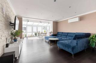 Wohnung kaufen in 65719 Hofheim am Taunus, Moderne Gartenwohnung im exklusiven Haus-im-Haus-Konzept in Hofheim-Wallau