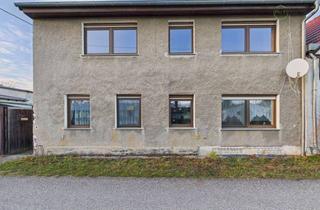 Einfamilienhaus kaufen in 03253 Doberlug-Kirchhain, Energieeffizientes Einfamilienhaus mit Kamin, Garten & Doppelgarage in ruhiger Lage