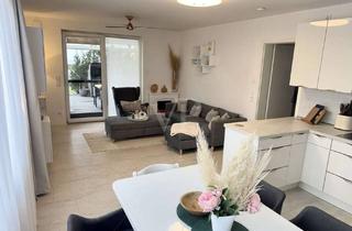 Wohnung kaufen in 01983 Großräschen, Exklusives Wohnen mit Hafenflair - gehobene Eigentumswohnung mit Terrasse & Garten direkt am See