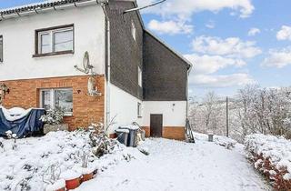 Doppelhaushälfte kaufen in 57319 Bad Berleburg, Modernisierte Doppelhaushälfte mit Ausbaureserve und Pelletheizung in Bad Berleburg