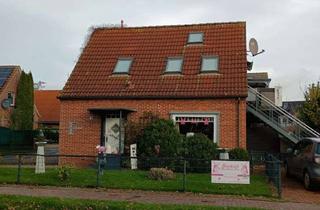 Haus kaufen in 26736 Krummhörn, Greetsiel: Zwei Ferienwohnungen unter einem Dach in Hafen und Hafen- & Mühlennähe.