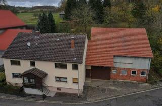 Einfamilienhaus kaufen in 36399 Freiensteinau, Einfamilienhaus mit großem Grundstück, idyllischen Grünflächen, Scheunen und Garagen in Freiensteina