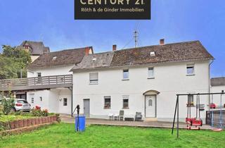 Haus kaufen in 35630 Ehringshausen, Zweifamilienhaus mit Baulücke - Kapitalanlage oder Eigennutzung